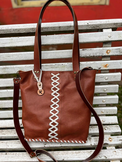 Cartera Nina en cuero legítimo.