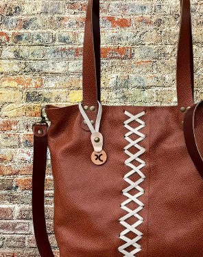 Cartera Nina en cuero legítimo.